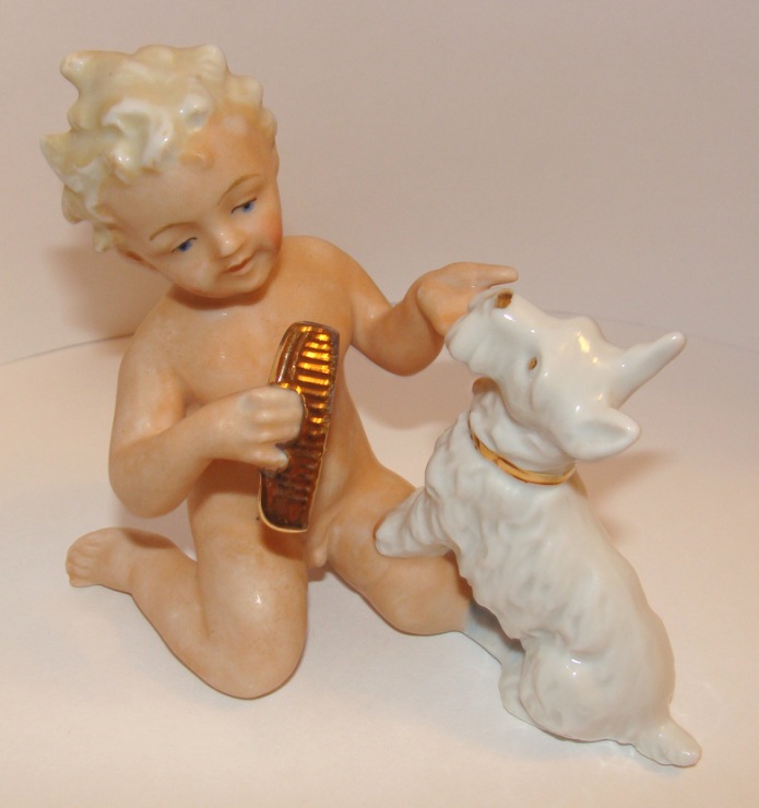 23. Путти, расчесывающий скотч-терьера